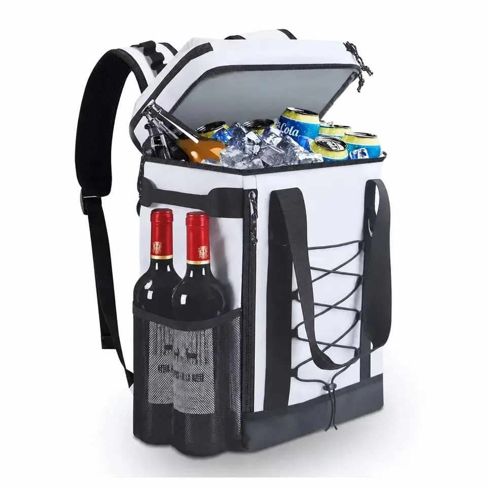 White insulated cooler backpack with open lid showing ice and cans, bungee cord and bottle mesh pocket