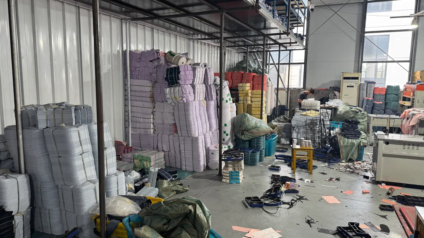 Cut backpack components sorted into bundles in the Senszx cutting room