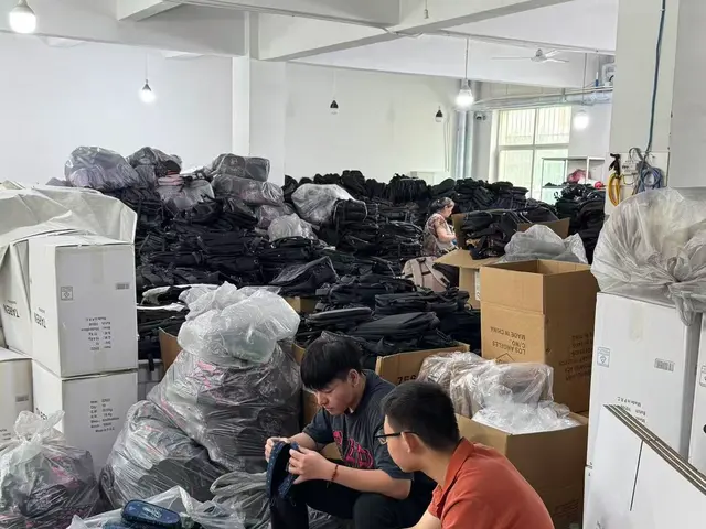Final inspection and carton packing of finished backpacks at Senszx