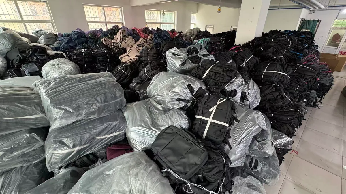 Packed backpacks staged for shipment