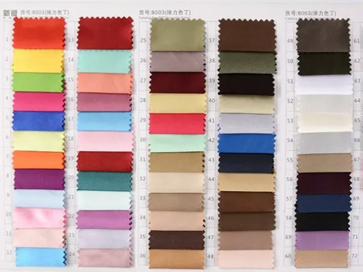 Pantone-matched polyester colour swatch book used for custom bag fabric sourcing