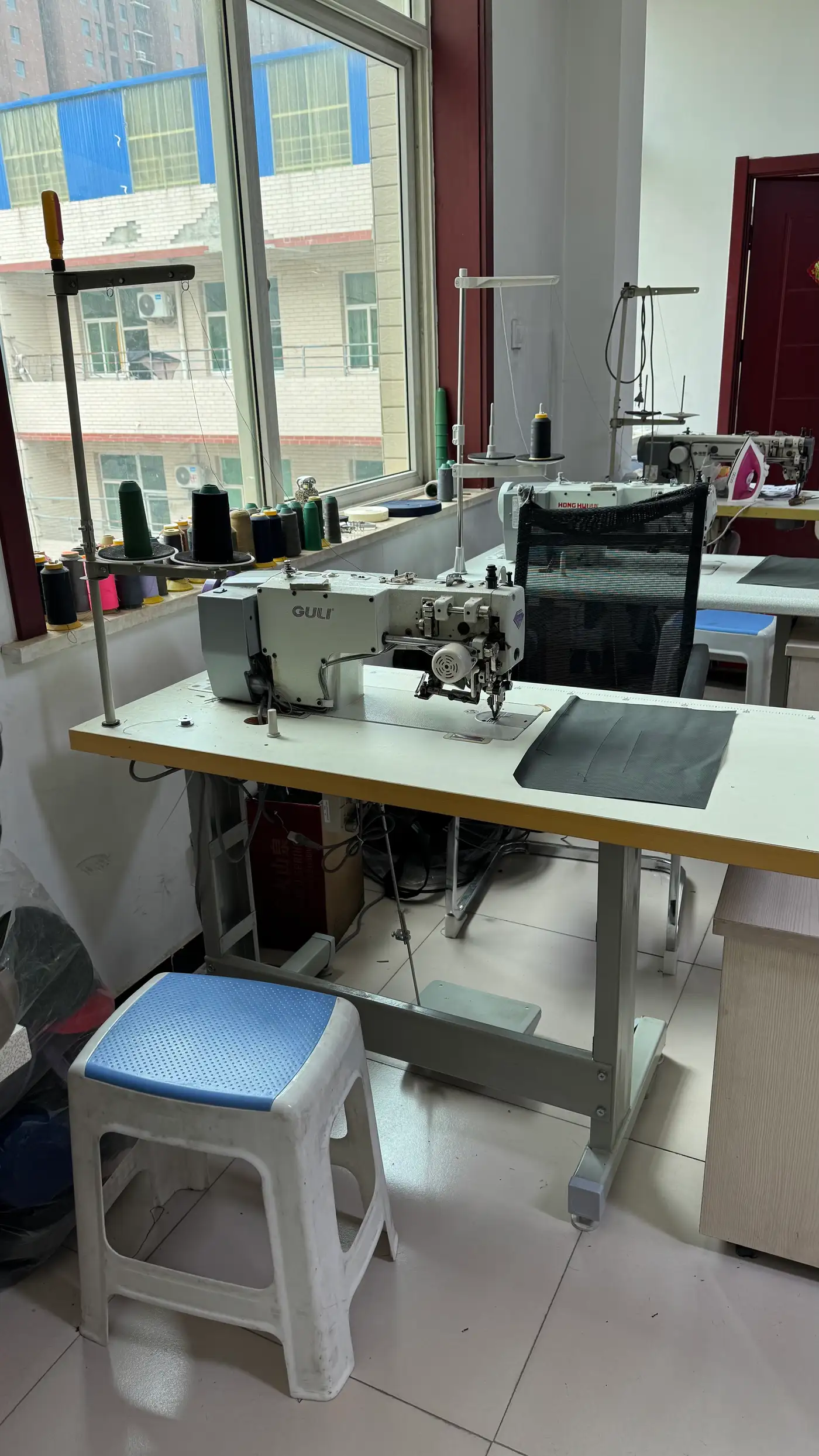 Sample sewing station in the Senszx pattern room where school backpack prototypes are built