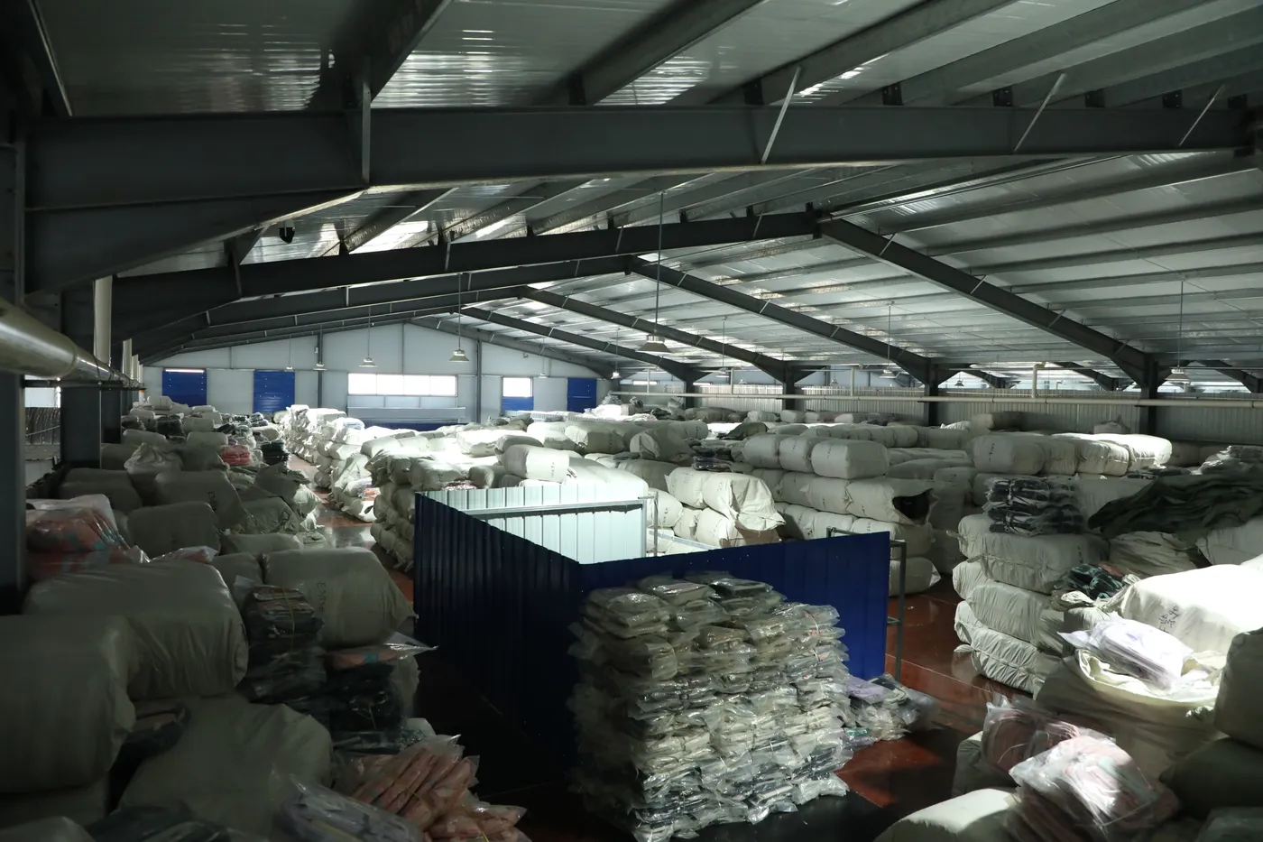 Baled stock backpacks in the finished-goods warehouse